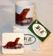 Load image into Gallery viewer, Wildlife Getting Along Collection - Otter and Salmon Ceramic Mug and Coaster by Helen Elizabeth