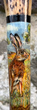 Load image into Gallery viewer, Hares in a field Hand Painted on Antler Handle Hazel Thumbstick by Helen Elizabeth Studios
