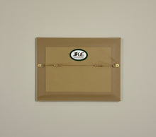 Load image into Gallery viewer, highland cow by a loch colouered pencil drawing by Helen Elizabeth Studios
