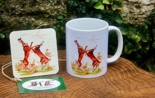 boxing hare mug and coaster by Helen Elizabeth